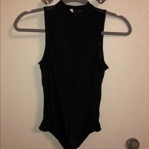 Black bodysuit/zipper infront